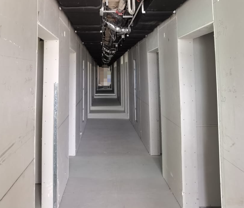 Transformed an open space into well partitioned areas with Drywall construction according to USG Standards