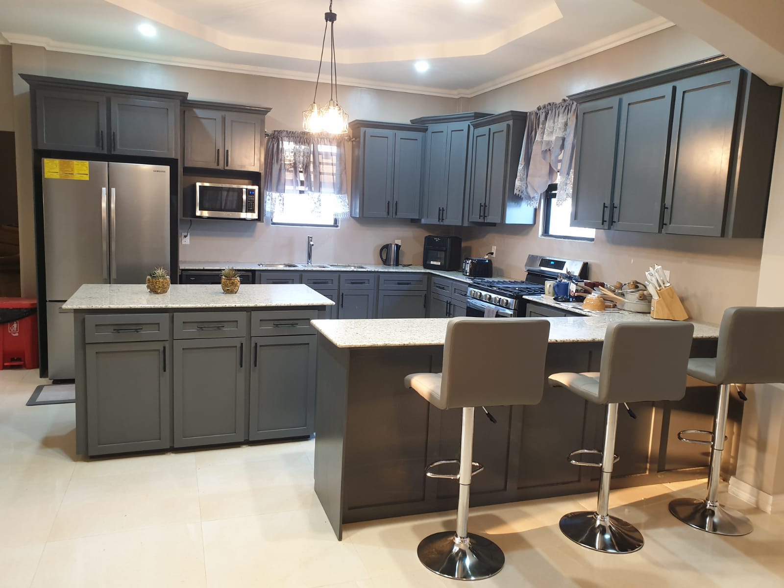 Complete renovation of a kitchen with modern appliances and finishes.
